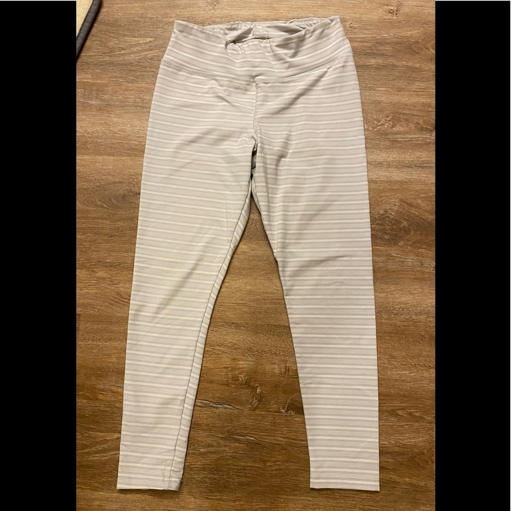 Leggings in very good condition. Gray and white striped